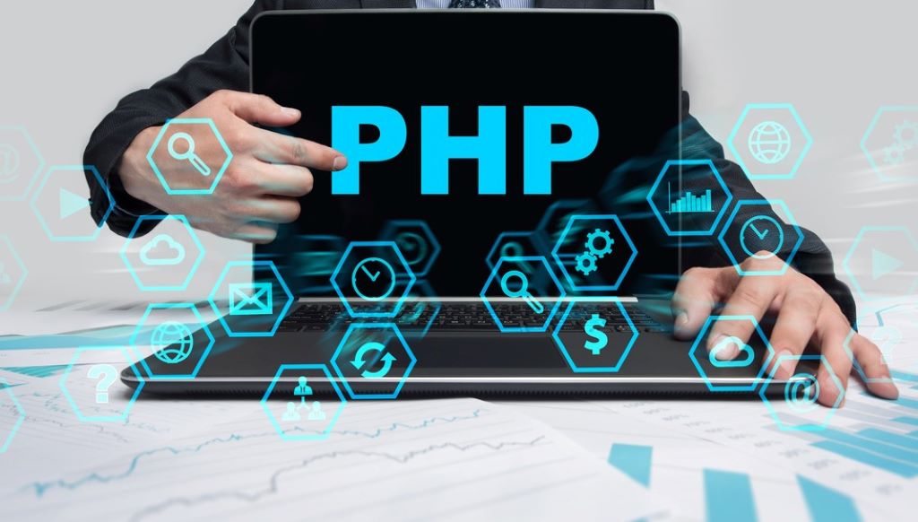 Programmer building a responsive PHP website with dynamic features
